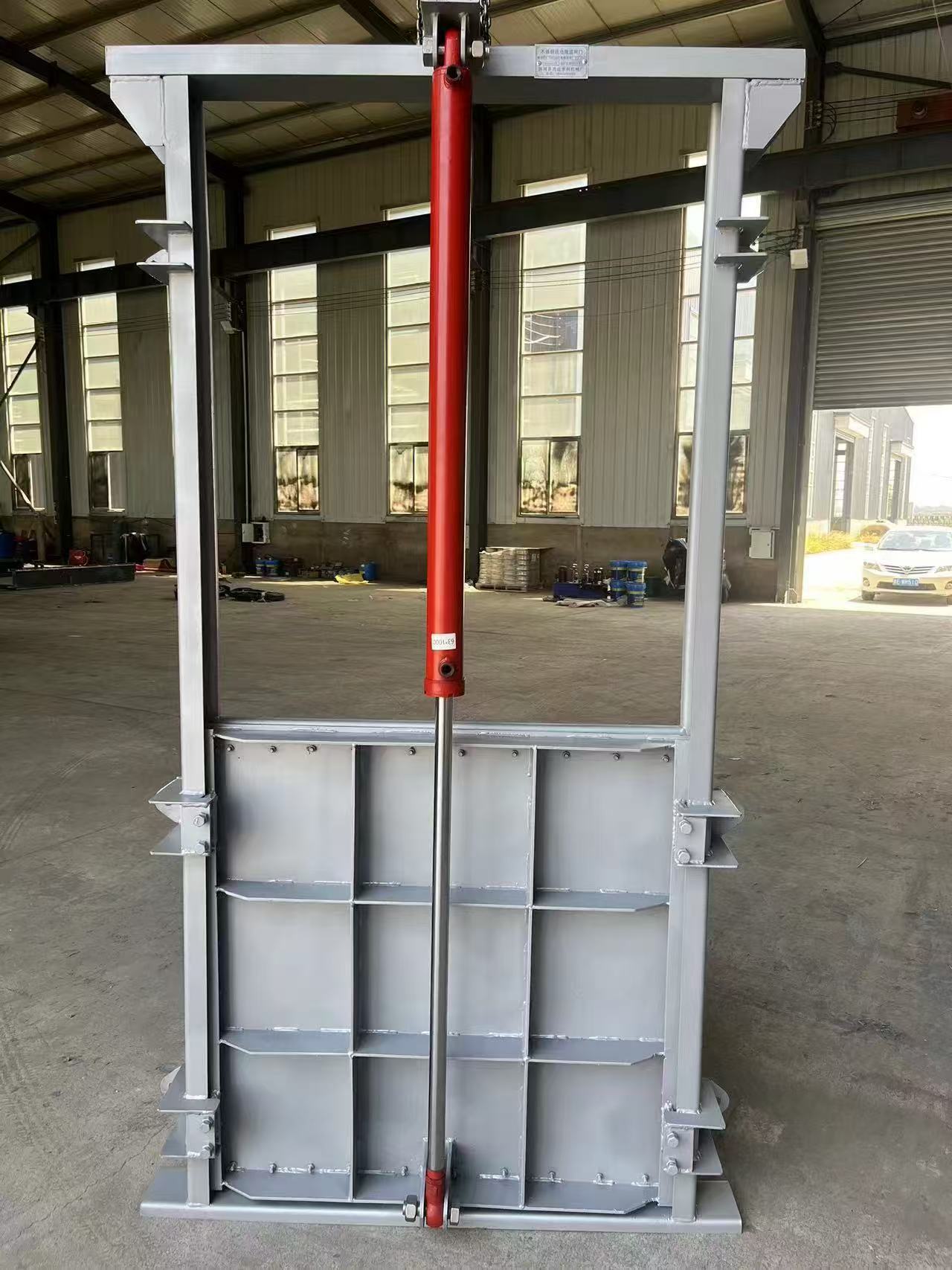 Hydraulically operated steel gate in the factory